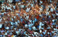 The Mexican wave, la ola: demonstration of propagation as the delayed response to a neighbouring displacement.